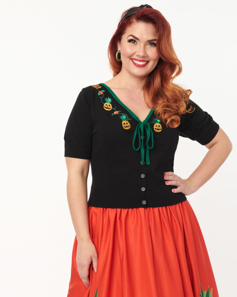 Front of a model wearing a size XL|1X Unique Vintage Black June-O-Ween Embroidered Cropped Dandy Cardigan in Black by Unique Vintage. | dia_product_style_image_id:299013